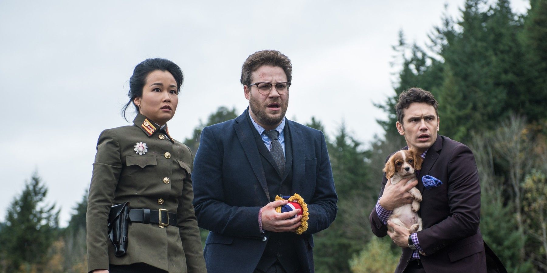 Diana Bang, Seth Rogen, and James Franco look worried in North Korea in The Interview