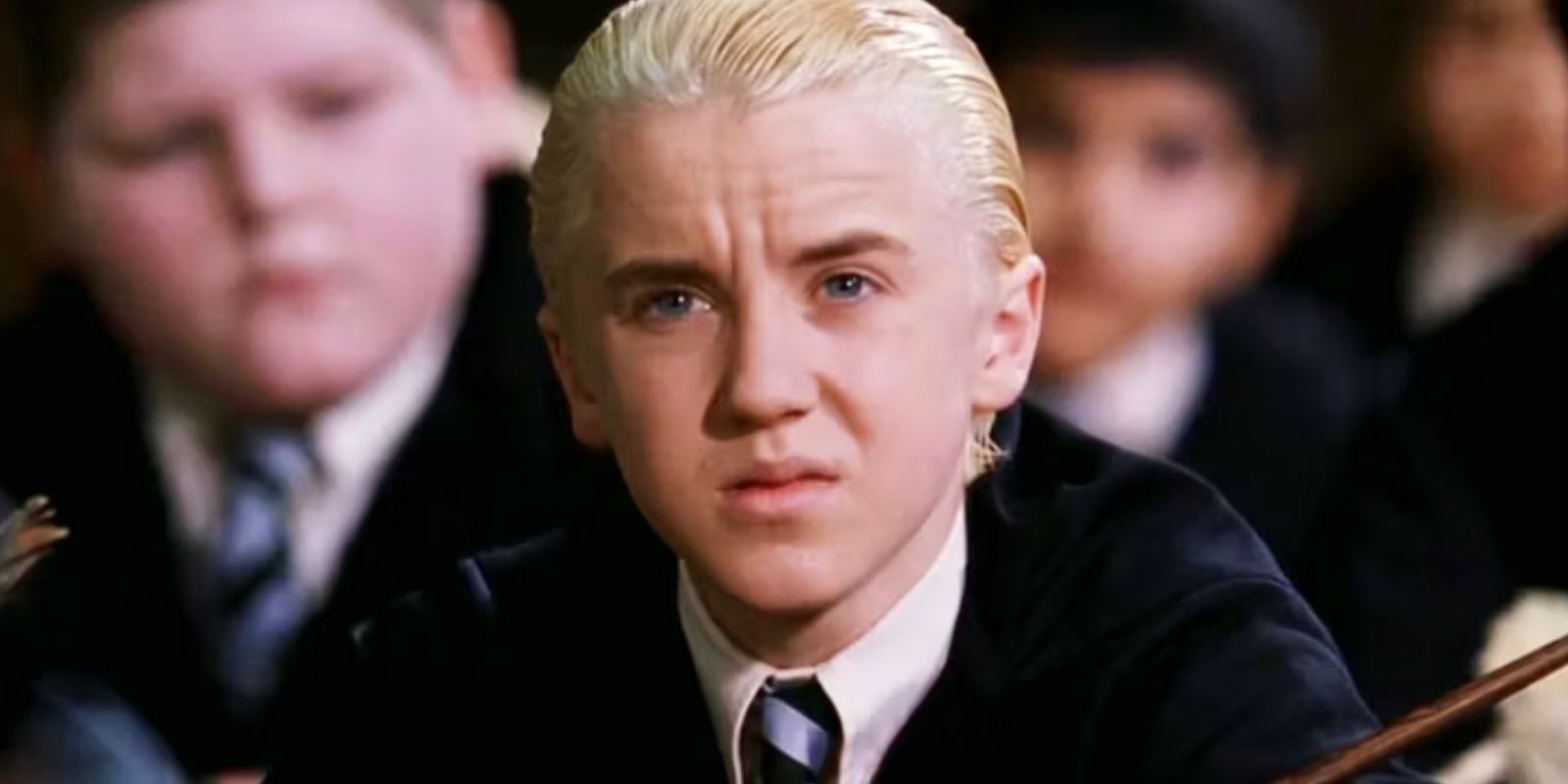 Draco Malfoy appears confused in class in Harry Potter and the Chamber of Secrets