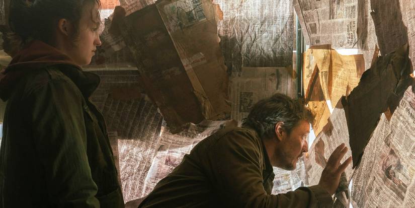 Ellie and Joel in the Last of Us episode 4 peering through a newspaper covered window