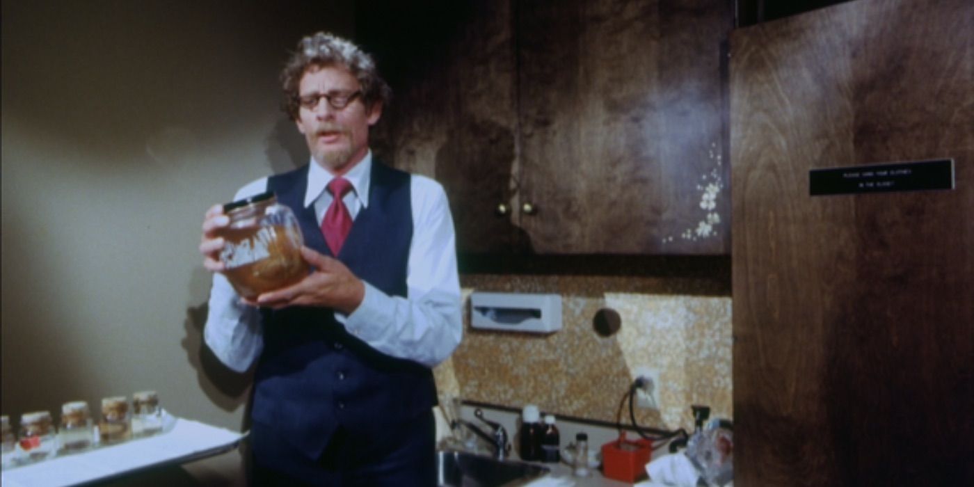 Dr. Gross holds up a jar in Faces of Death