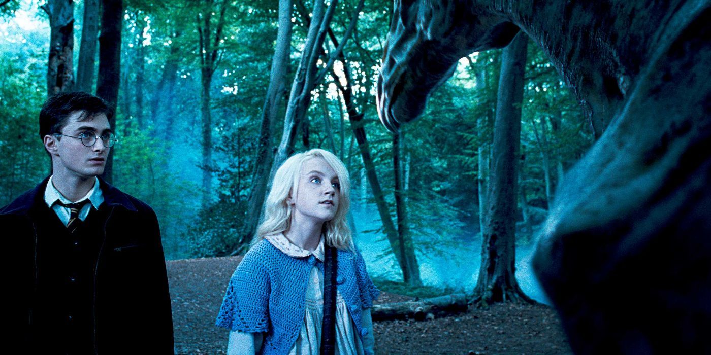 An image of Luna Lovegood and Harry standing with Thestrals