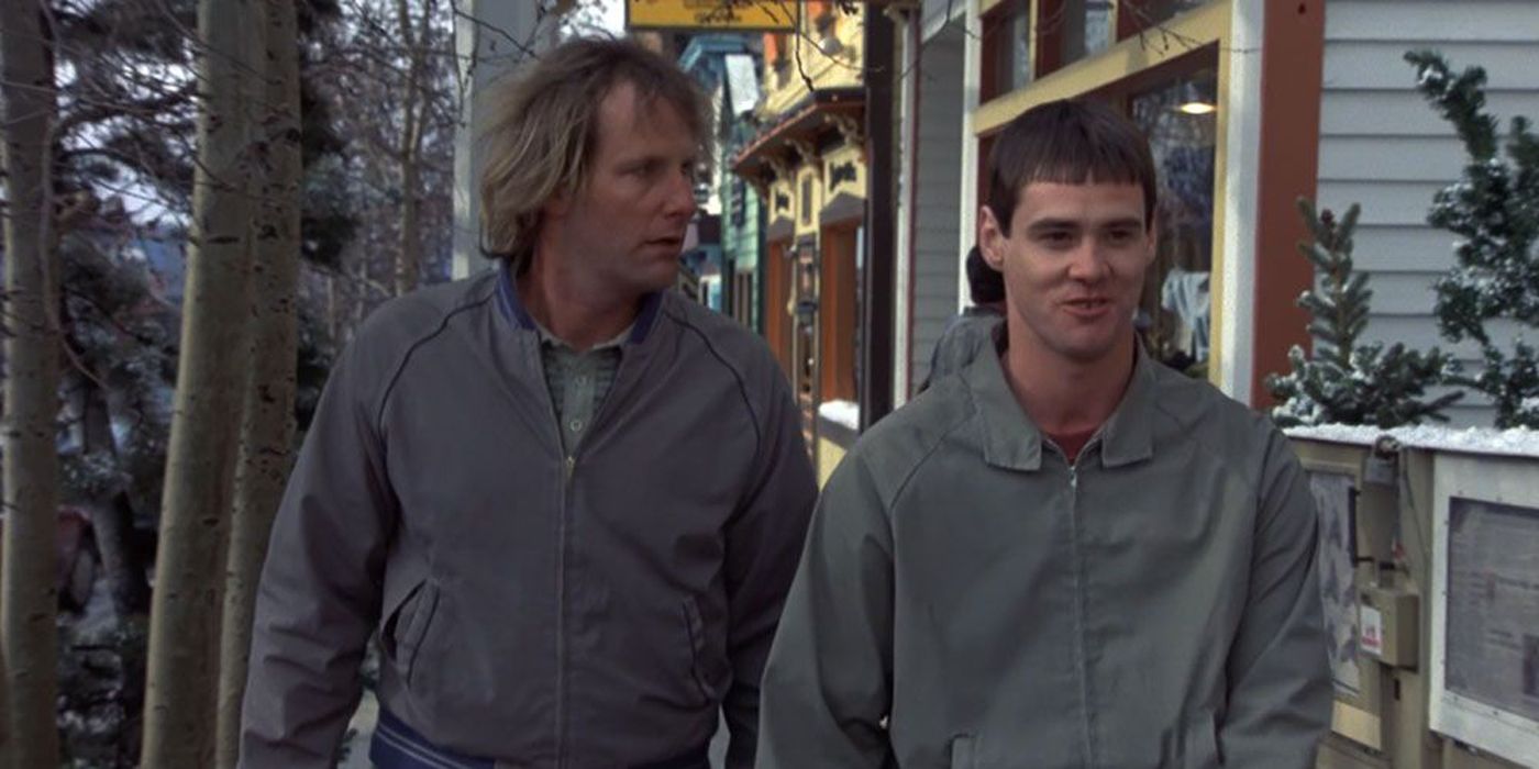 Harry and Lloyd walking down the street in Dumb & Dumber.