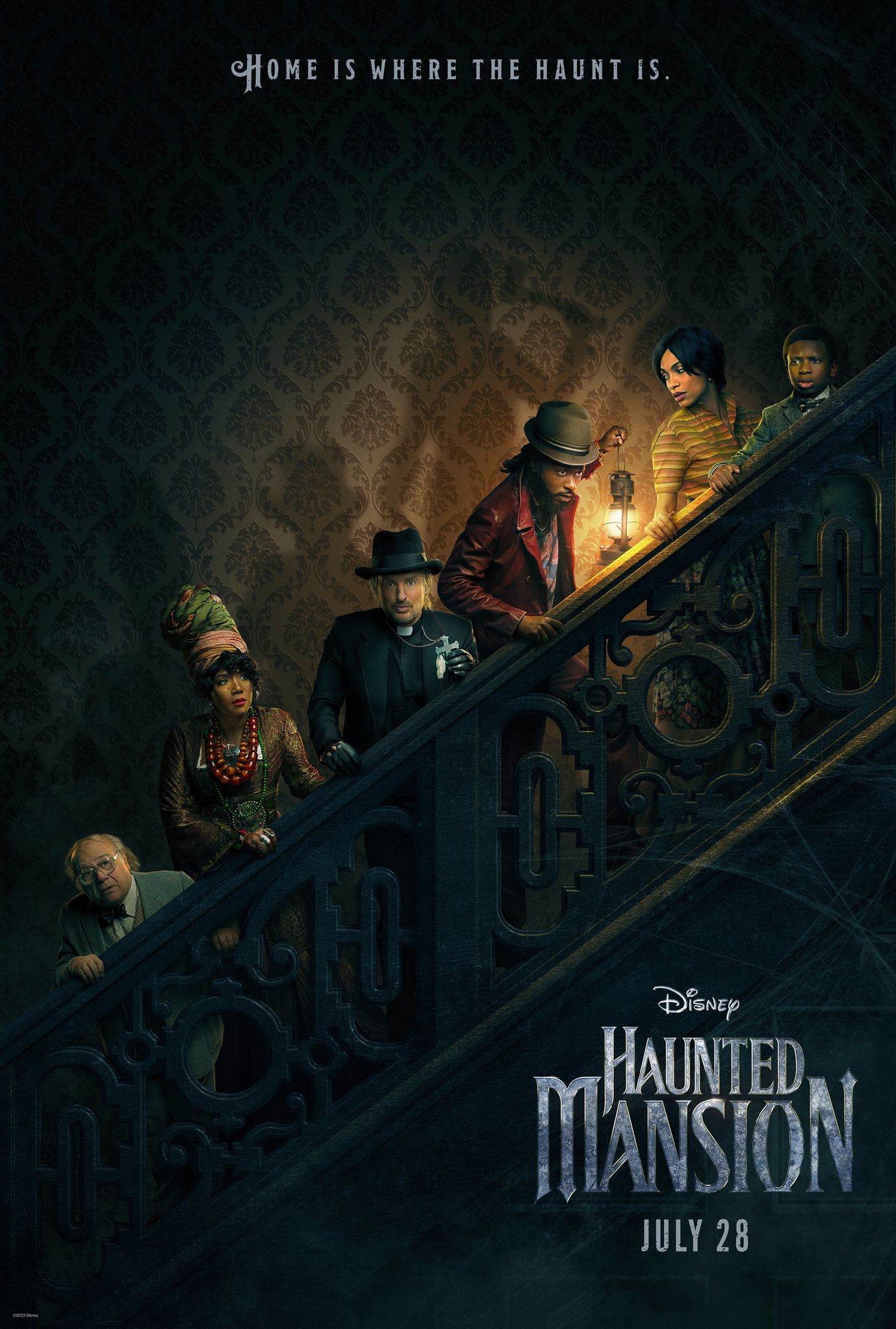 Haunted Mansion poster featuring core cast members walking up a staircase.
