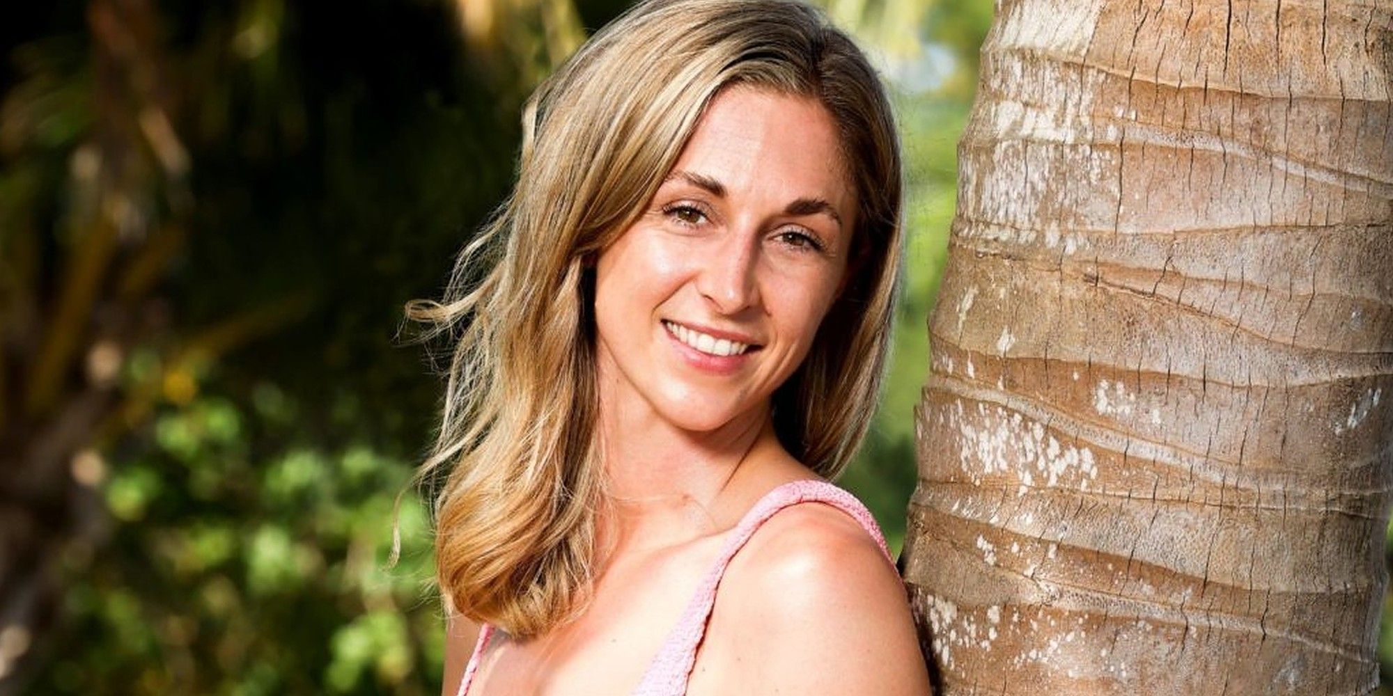 Hayley Leake Australian Survivor Heroes V Villains posing near tree