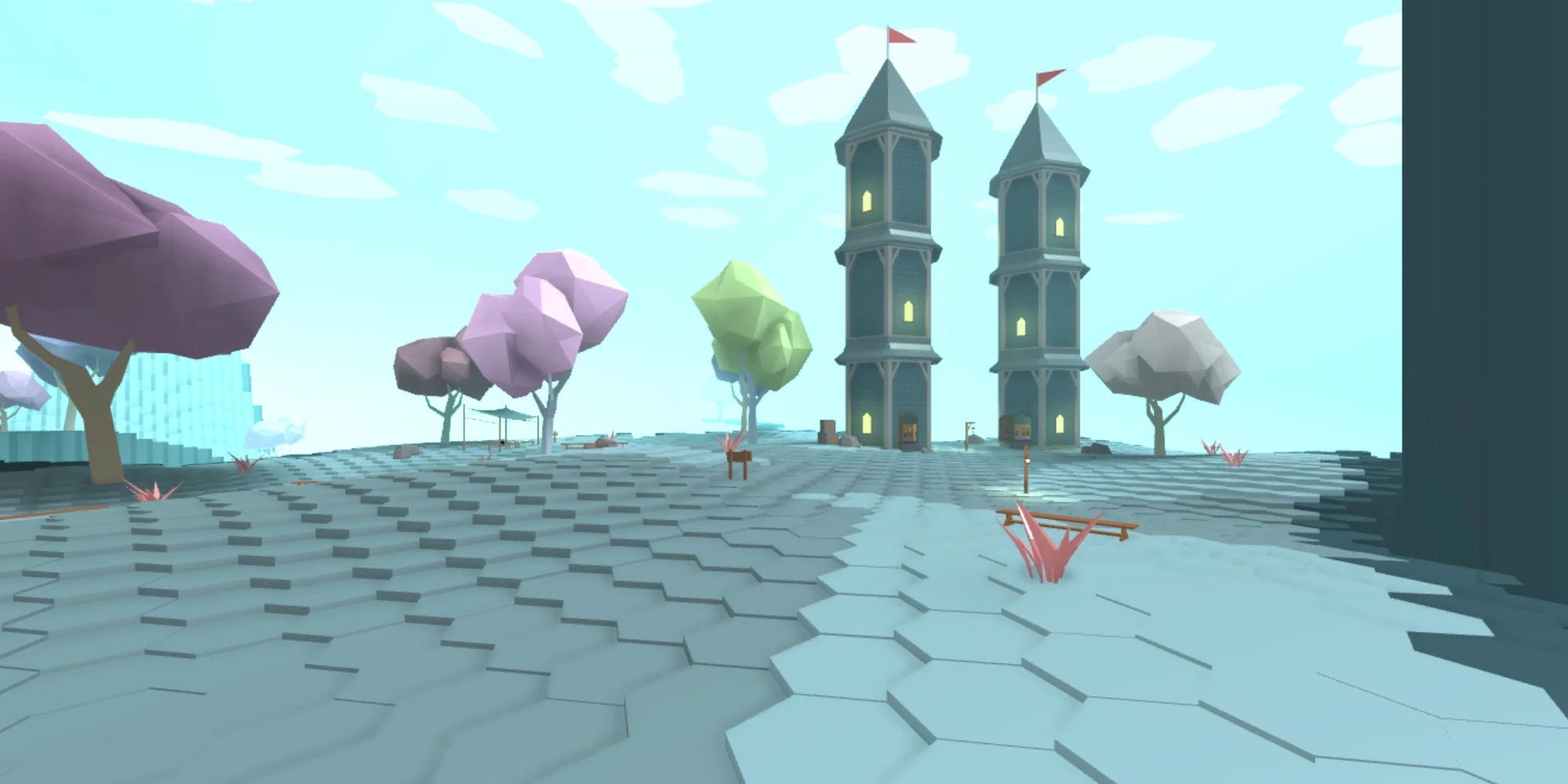 Pemandangan dari game Roblox Hexaria dengan tanah biru berubin heksagonal dan dua menara.