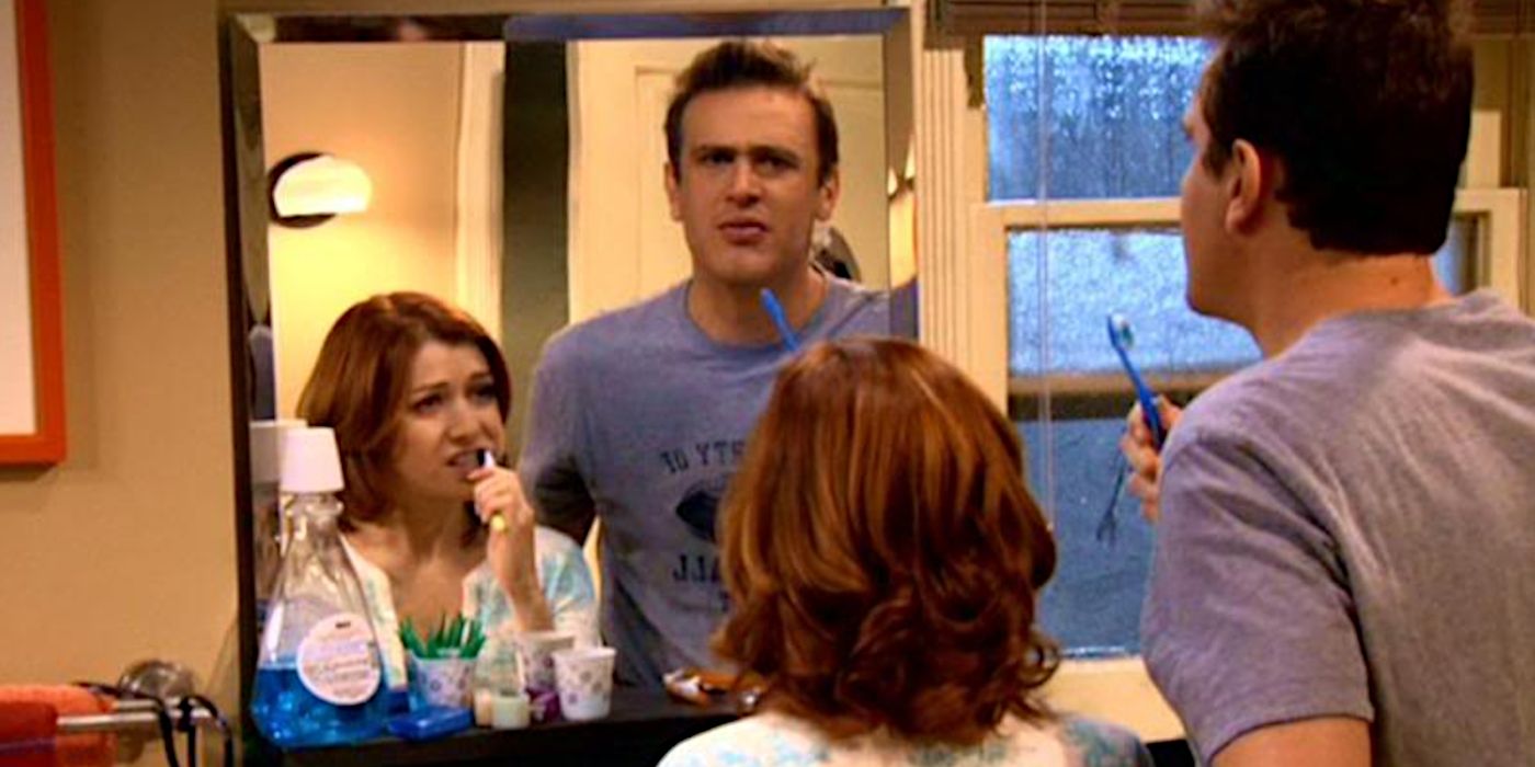 How I Met Your Mother Lily and Marshall brushing their teeth in the bathroom