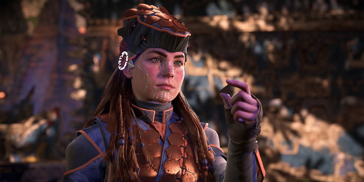 Aloy wearing face paint and a sci-fi headpiece in Horizon Forbidden West