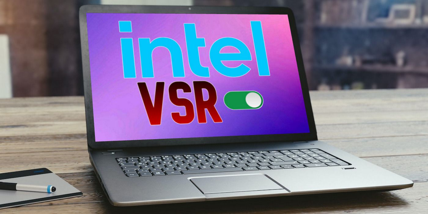 An open laptop on a wooden desk, with the words 'Intel VSR' written on the screen. The screen also shows a tiny green switch in the 'On' position