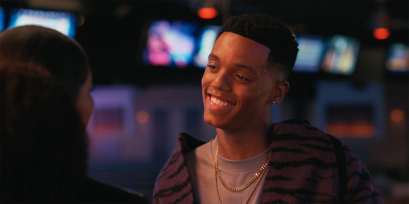 Jabari Banks smiling at someone in Bel-Air season 2