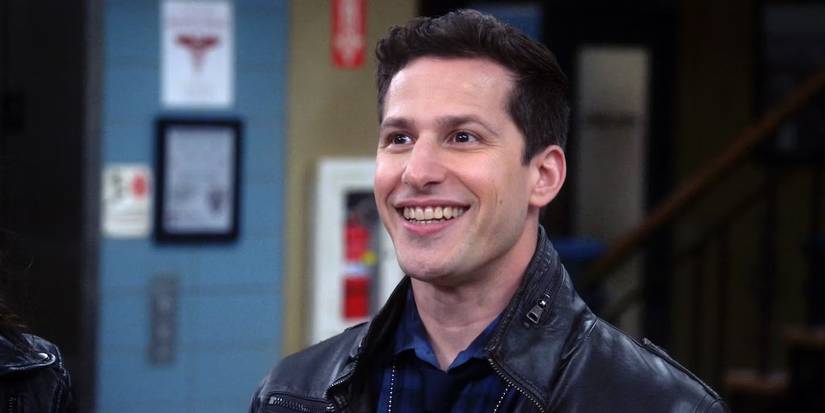 Jake smiling nervously in Brooklyn 99