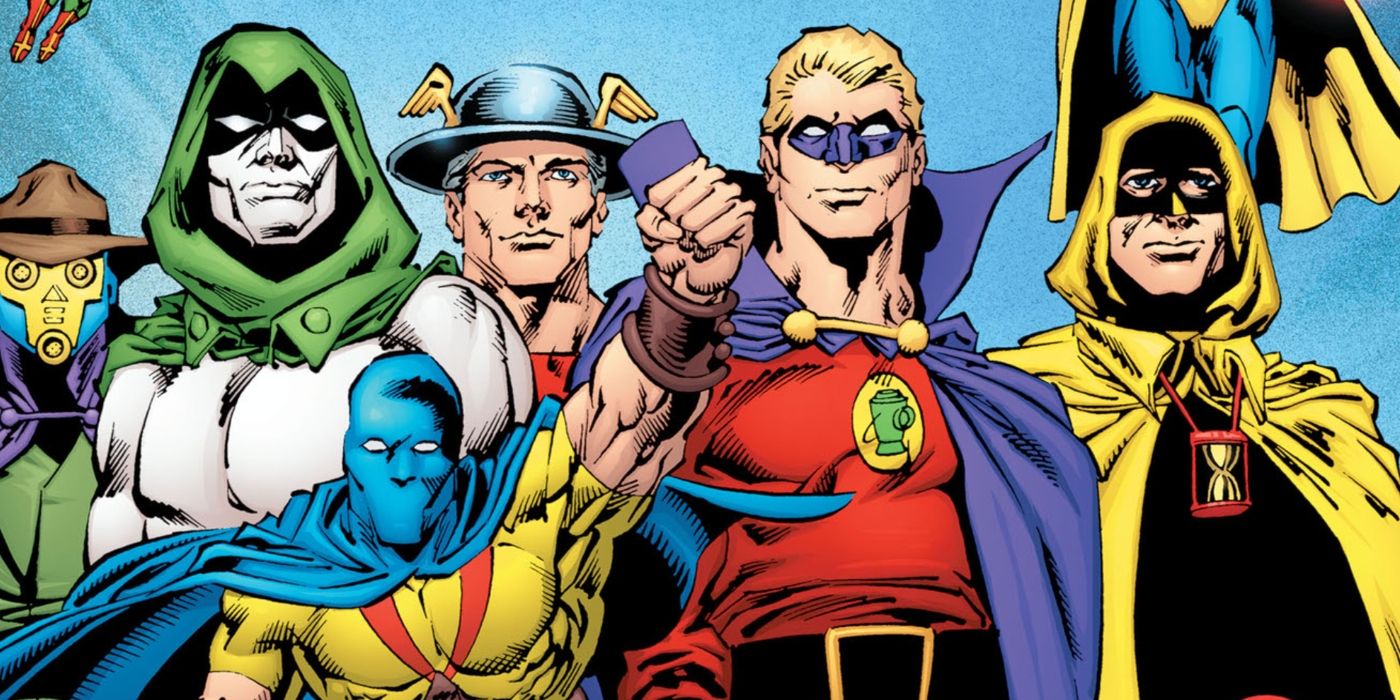 Comic Art: The Justice Society, including Green Lantern Alan Scott and Flash Jay Garrick, pose together.