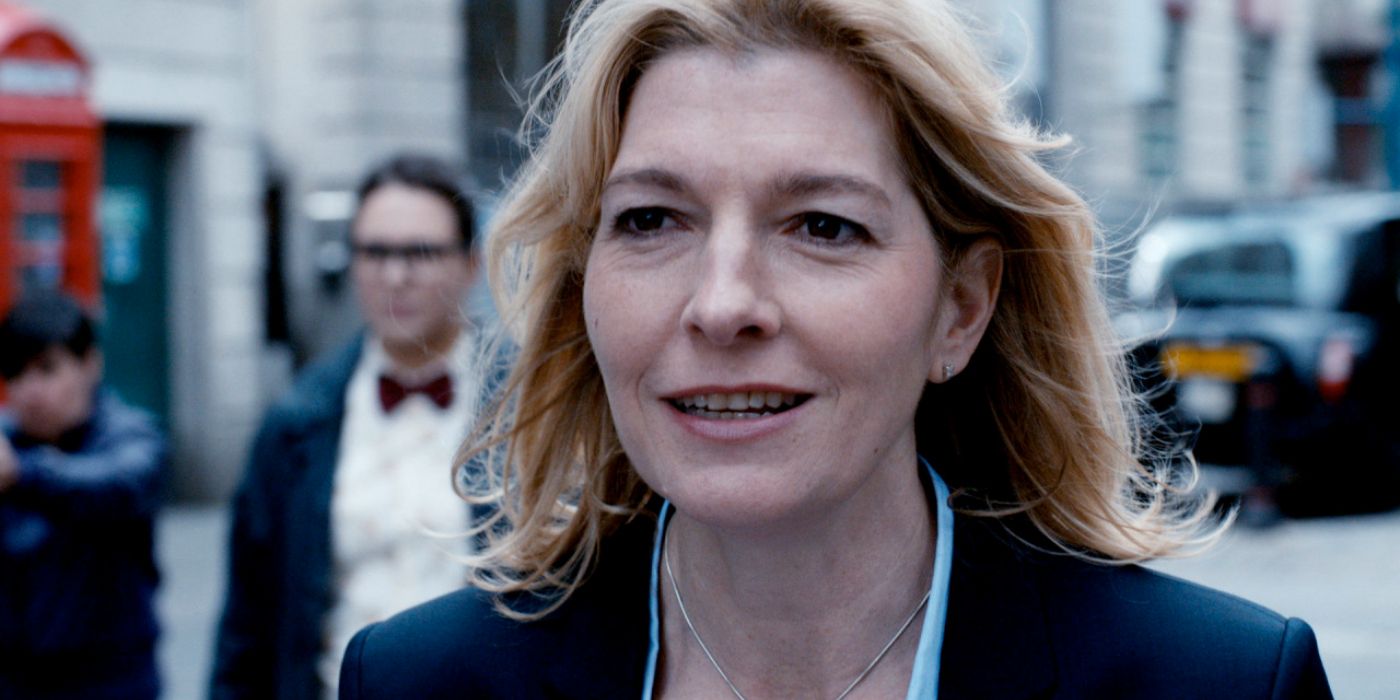 Kate Stewart smiling while walking in the London streets in Doctor Who