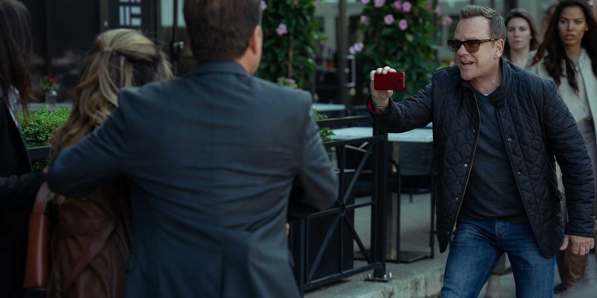 kiefer sutherland holds up phone in rabbit hole 102