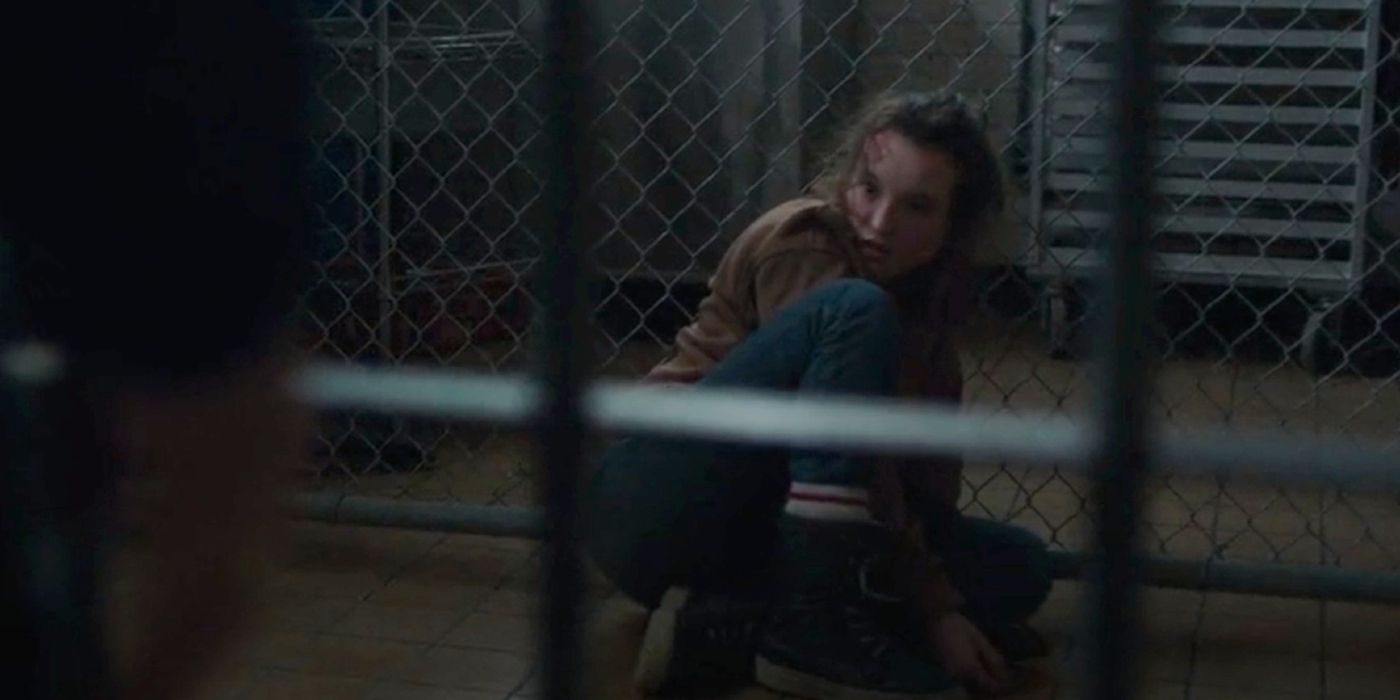 Ellie looking fearful in her cage in Last of Us episode 8