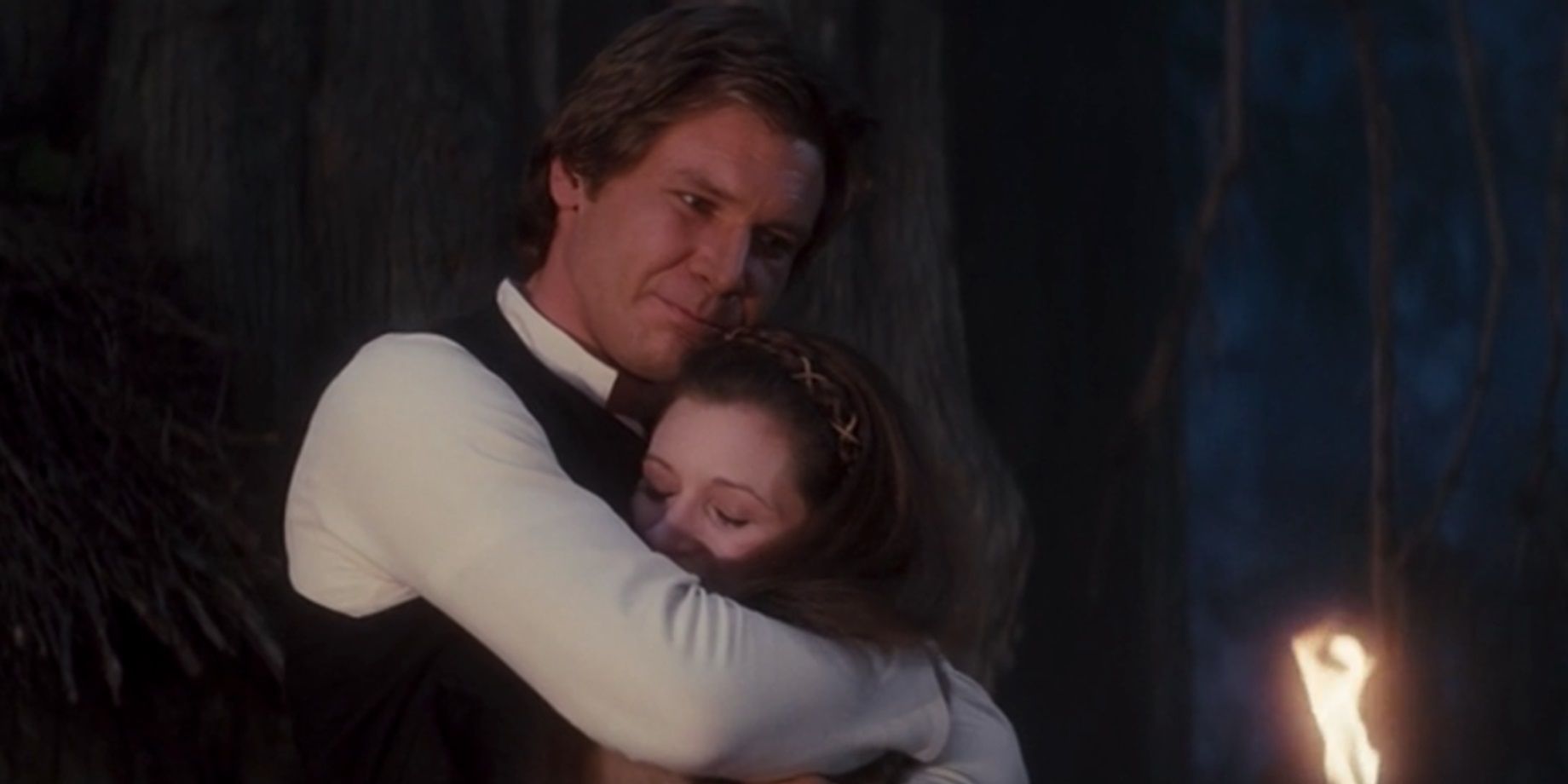 Leia hugs Han on Endor in Return of the Jedi