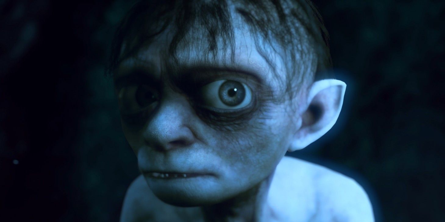 An image of Gollum in The Lord Of The Rings: Gollum looking toward the camera with one eye turned closer while the other is in shadow.