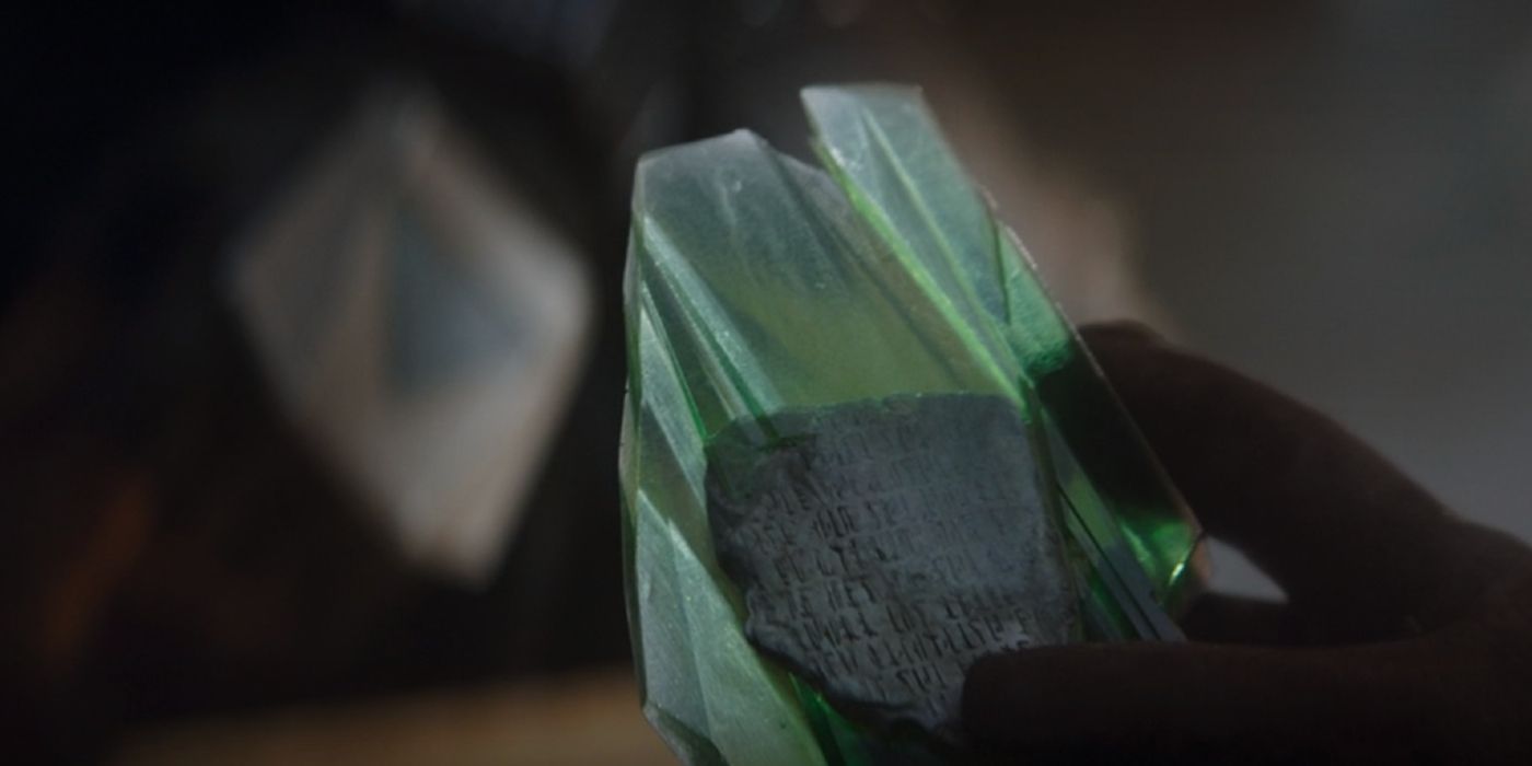 The Armorer holding a crystal from Mandalore in Mandalorian season 3, episode 1.