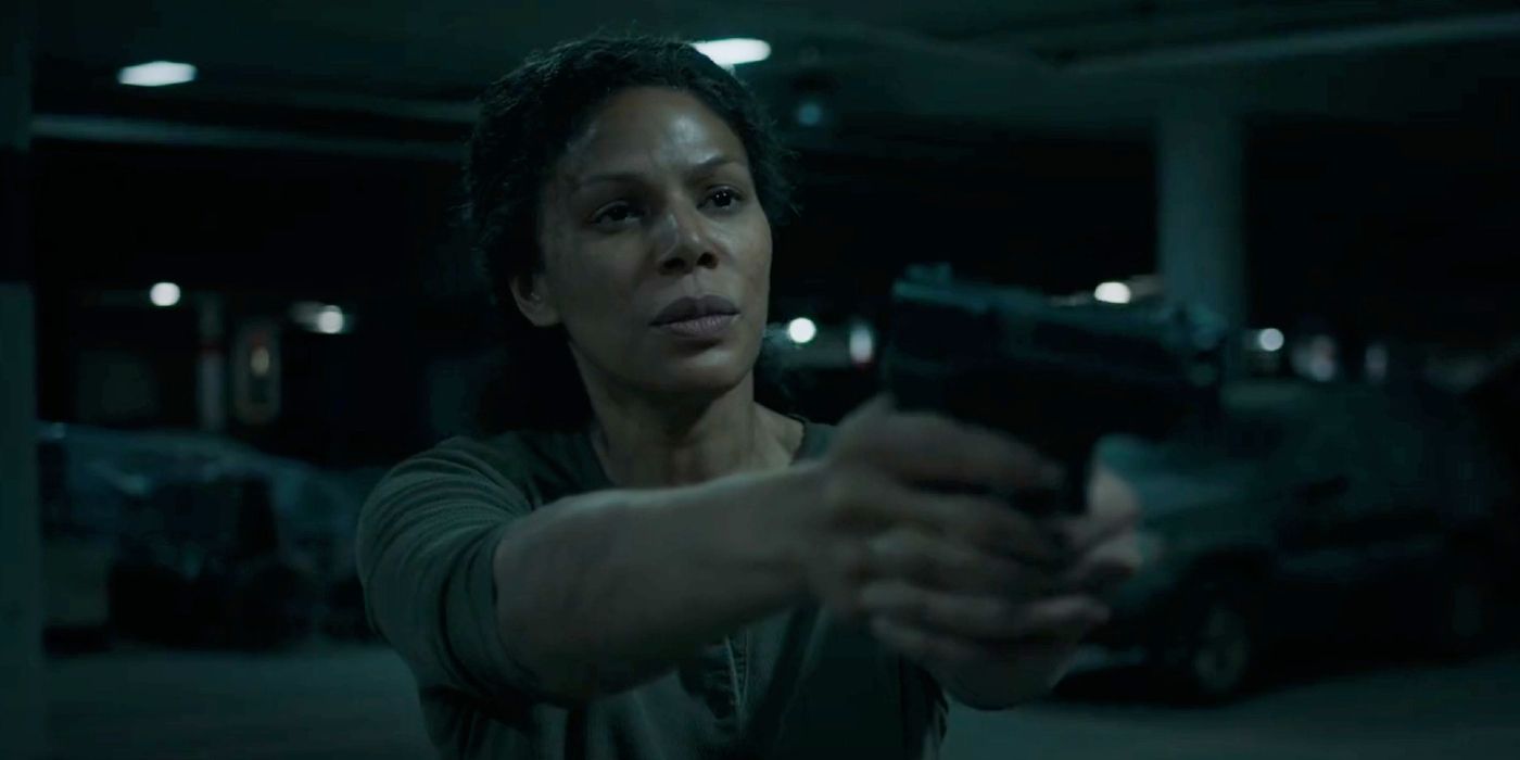 Marlene apuntando con su arma a Joel en el episodio 9 de The Last of Us