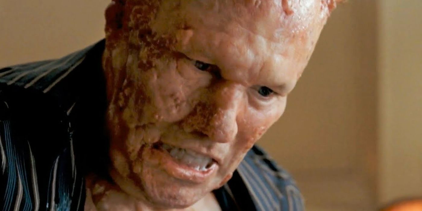 Michael Rooker turning into a monster in Slither
