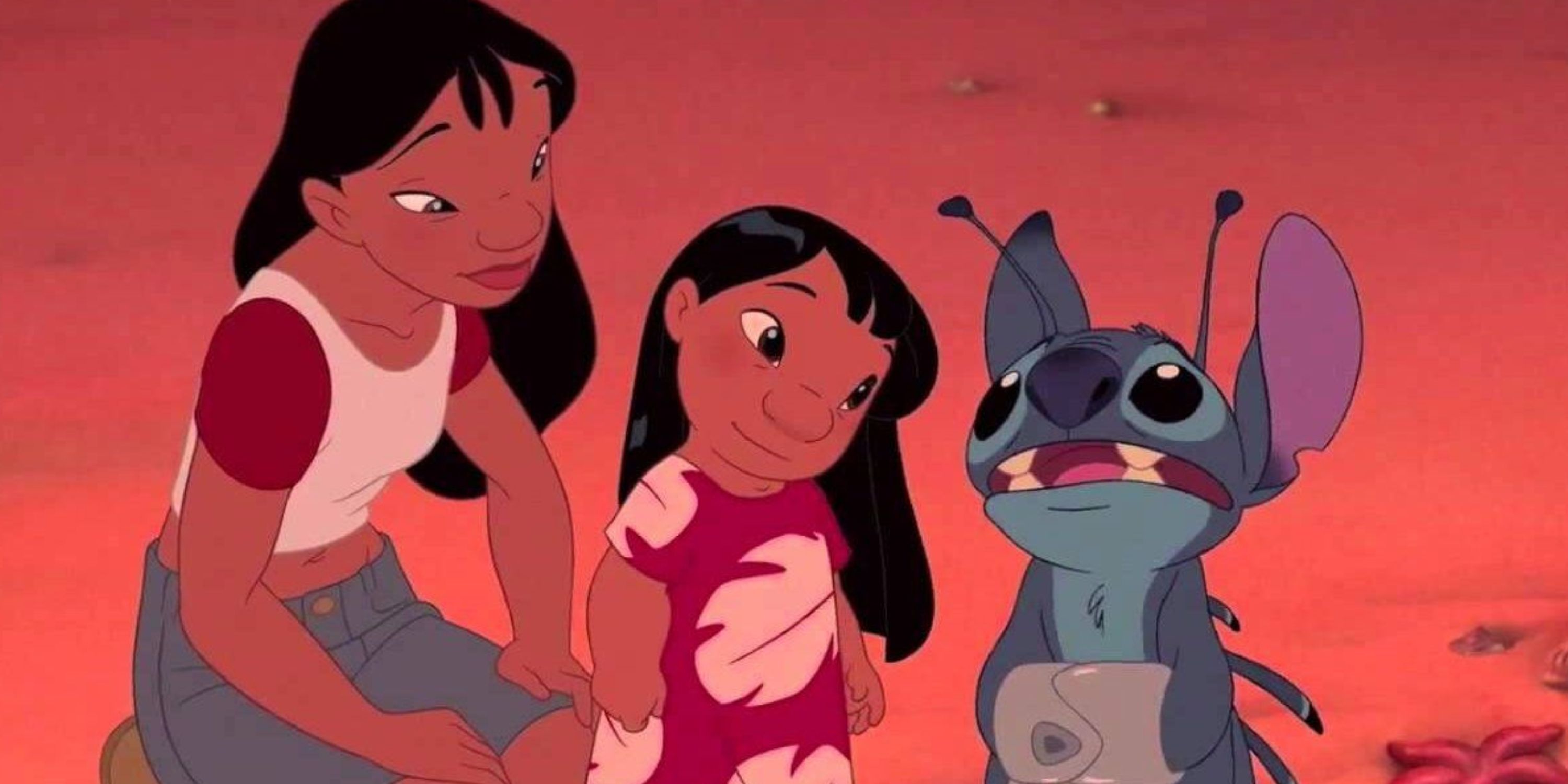 Nani and Lilo looking at Stitch as he talks at the end of Lilo and Stitch (2002)