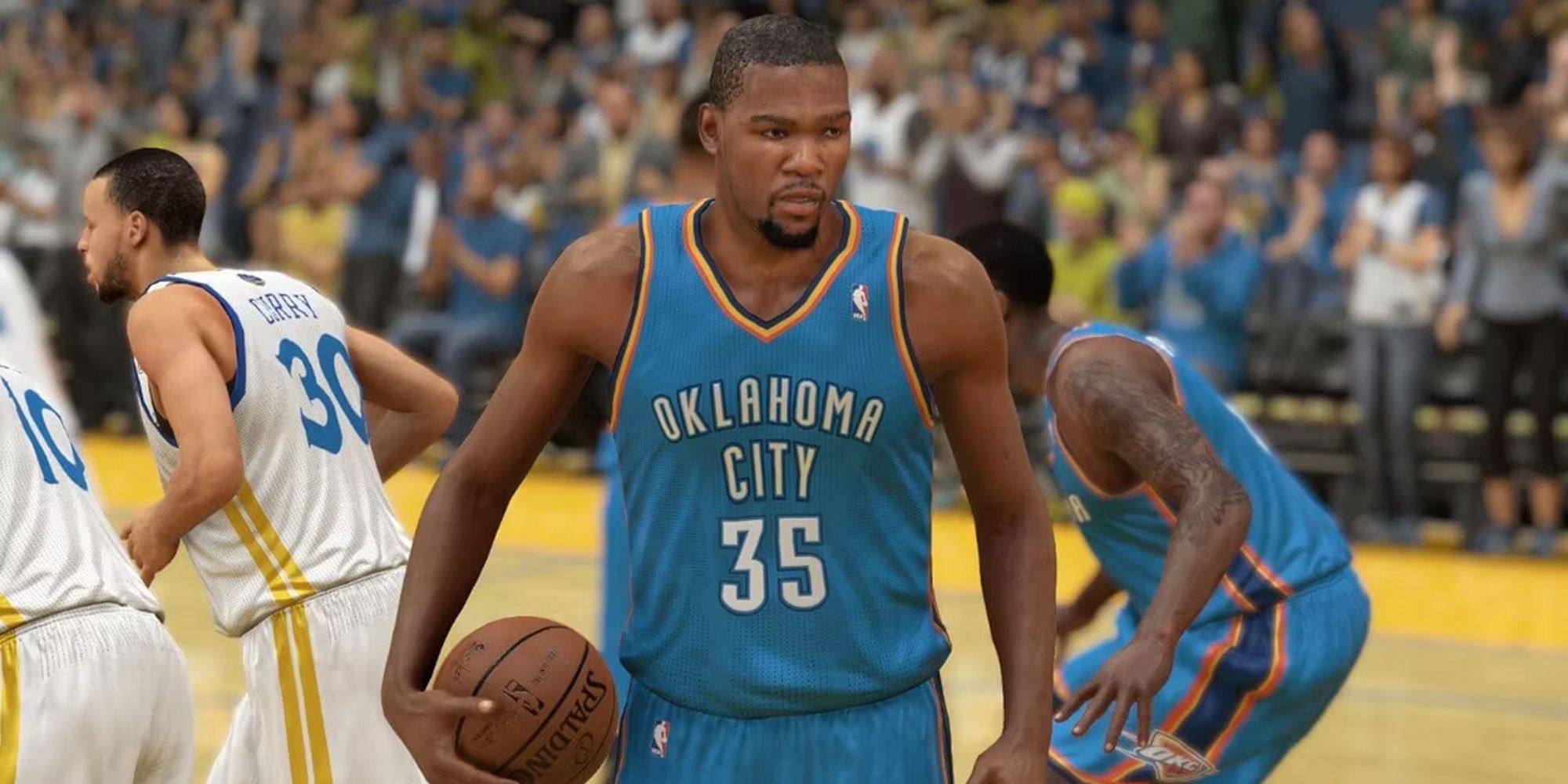 Kevin Durant in an Oklahoma City jersey holding the ball in NBA 2K14