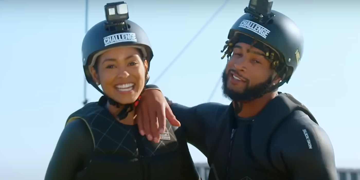 Nelson Thomas and Nurys Mateo wear helmets and smile at The Challenge