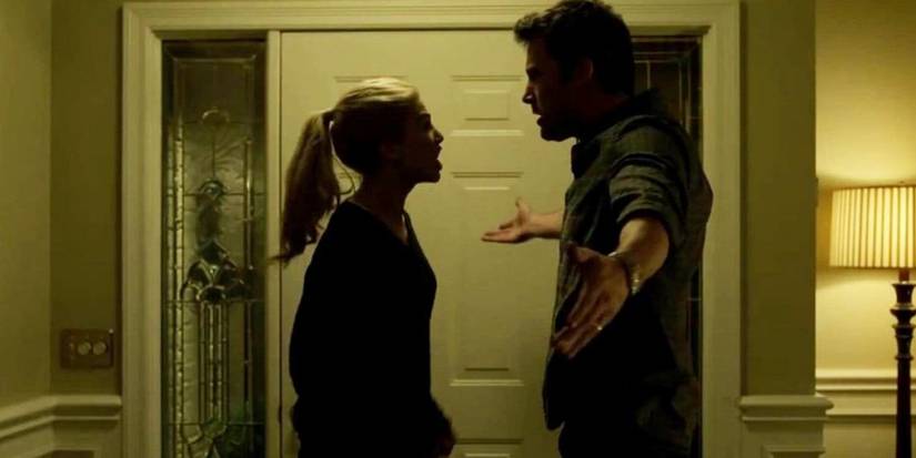 Nick (Ben Affleck) and Amy (Rosamund Pike) having an argument in Gone Girl