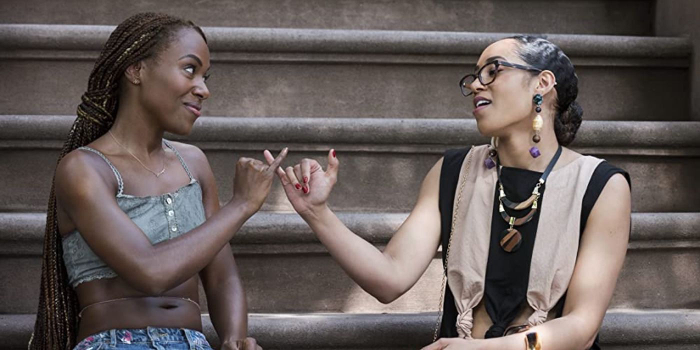 Nola Darling and Clorinda doing a pinky promise in She's Gotta Have It (1)