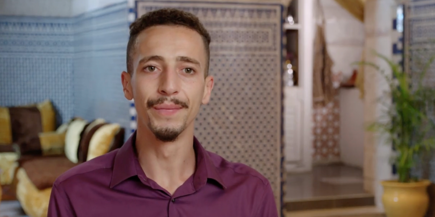 Oussama From 90 Day Fiancé: The Other Way wearing burgundy shirt 