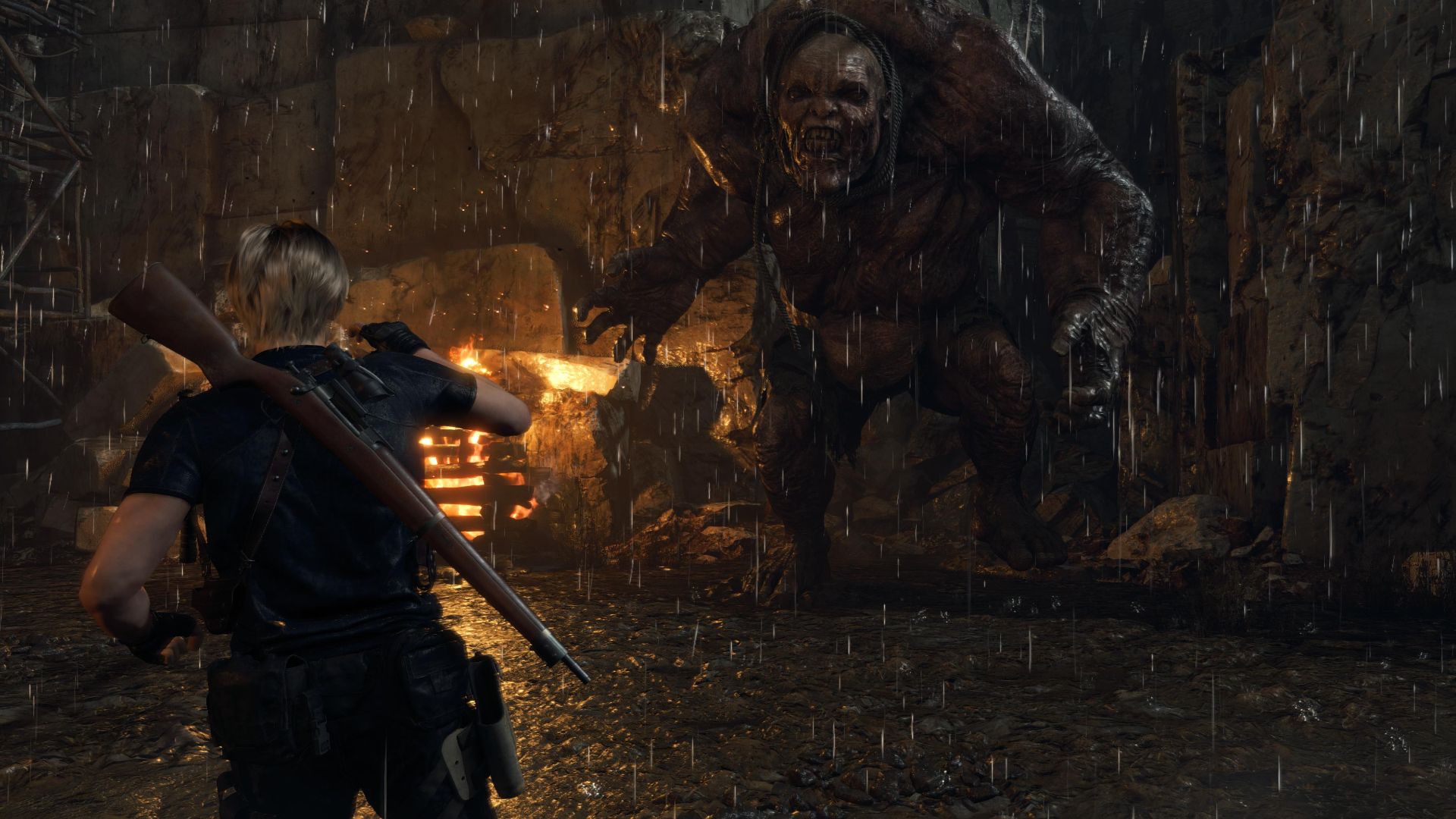 Leon standing in the rain as a giant approaches in the remake of Resident Evil 4