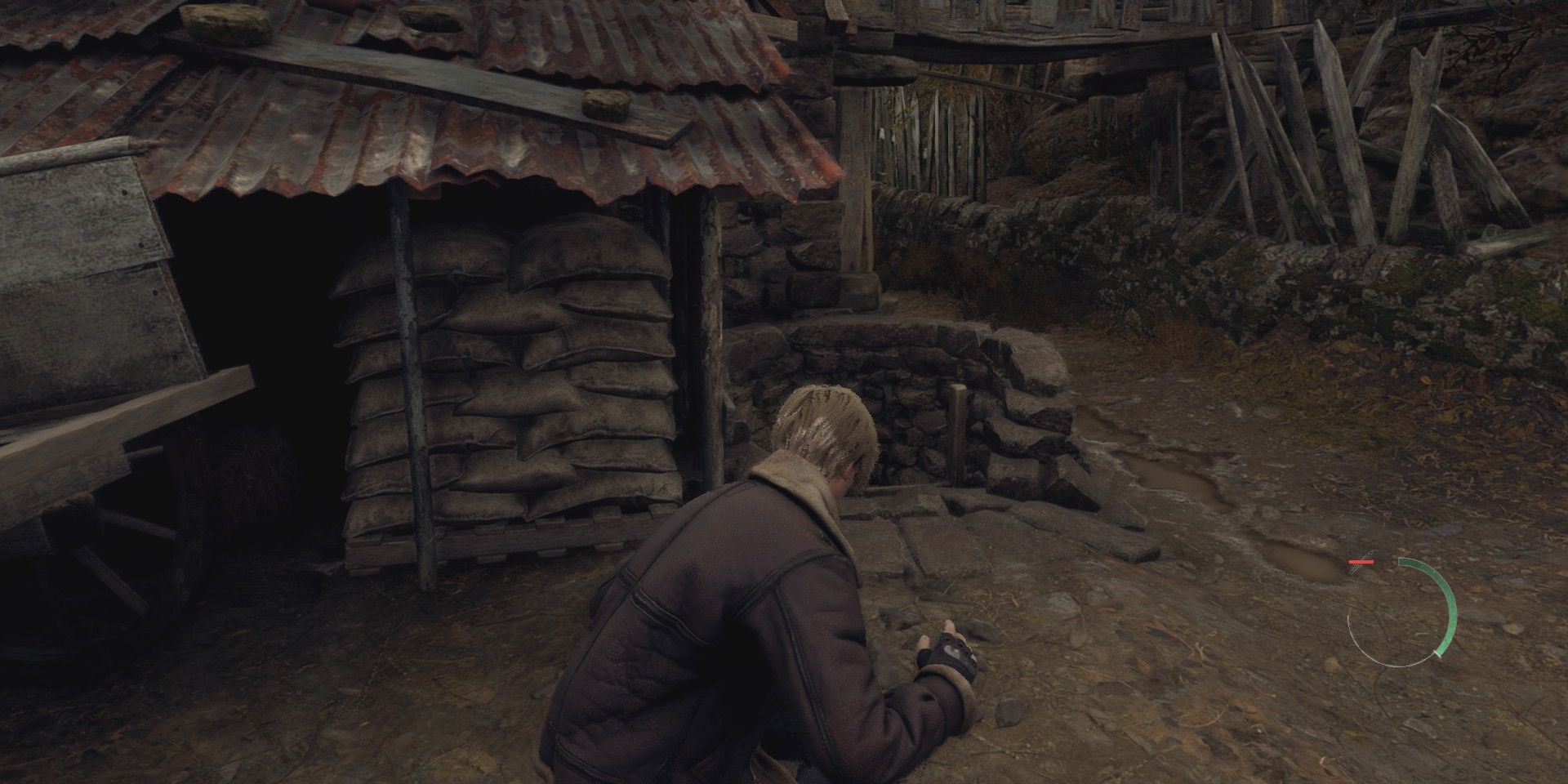 Leon standing in front of a well in the village in the Resident Evil 4 Chainsaw Demo.