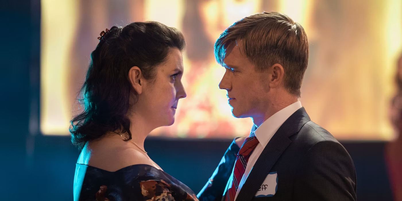 Shauna (Melanie Lynskey) and Jeff (Warren Kole) dancing together in Yellowjackets season 1 finale