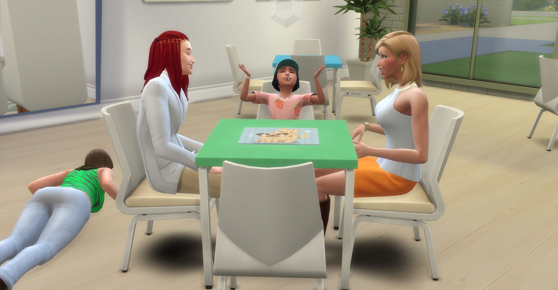 Sims 4 Growing Together game table showing three Sims sitting around a completed puzzle.