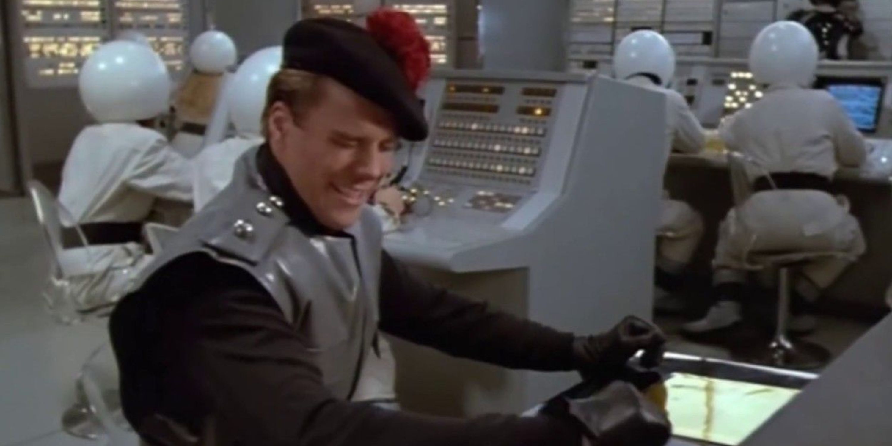 Snotty at his control panel in Spaceballs