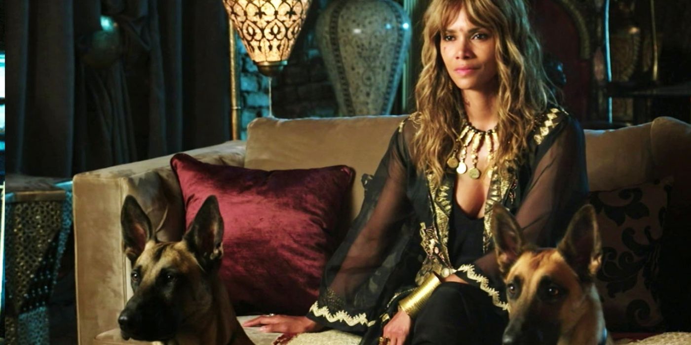 Sophia sitting on a couch with her dogs in John Wick 3