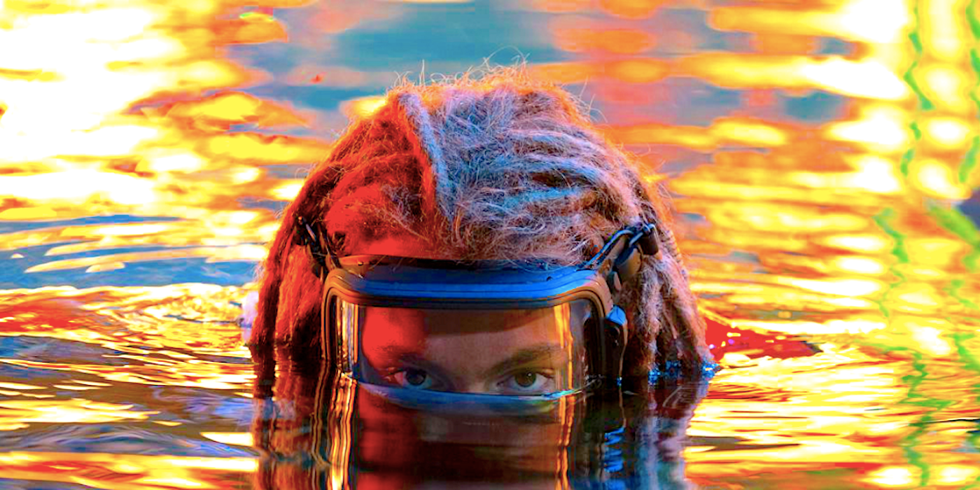 Spider (Jake Champion) slowly rising out of the water in Avatar 2.