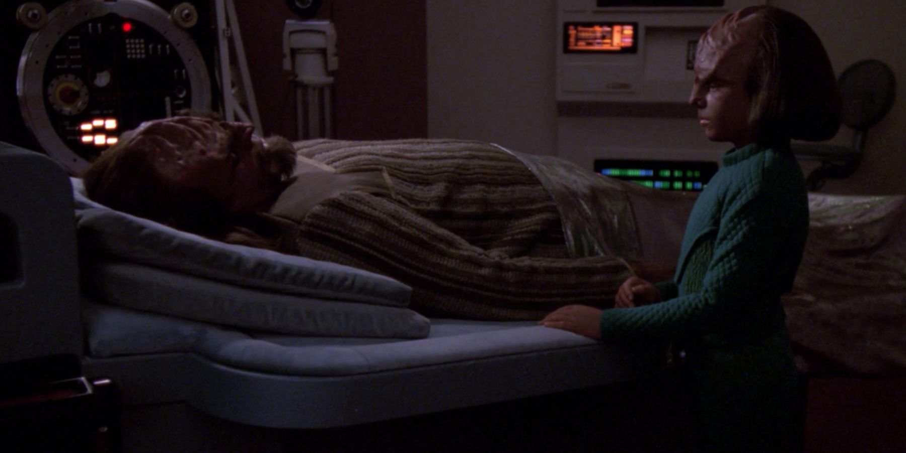 Worf is comforted in sickbay by his son Alexander in Ethics