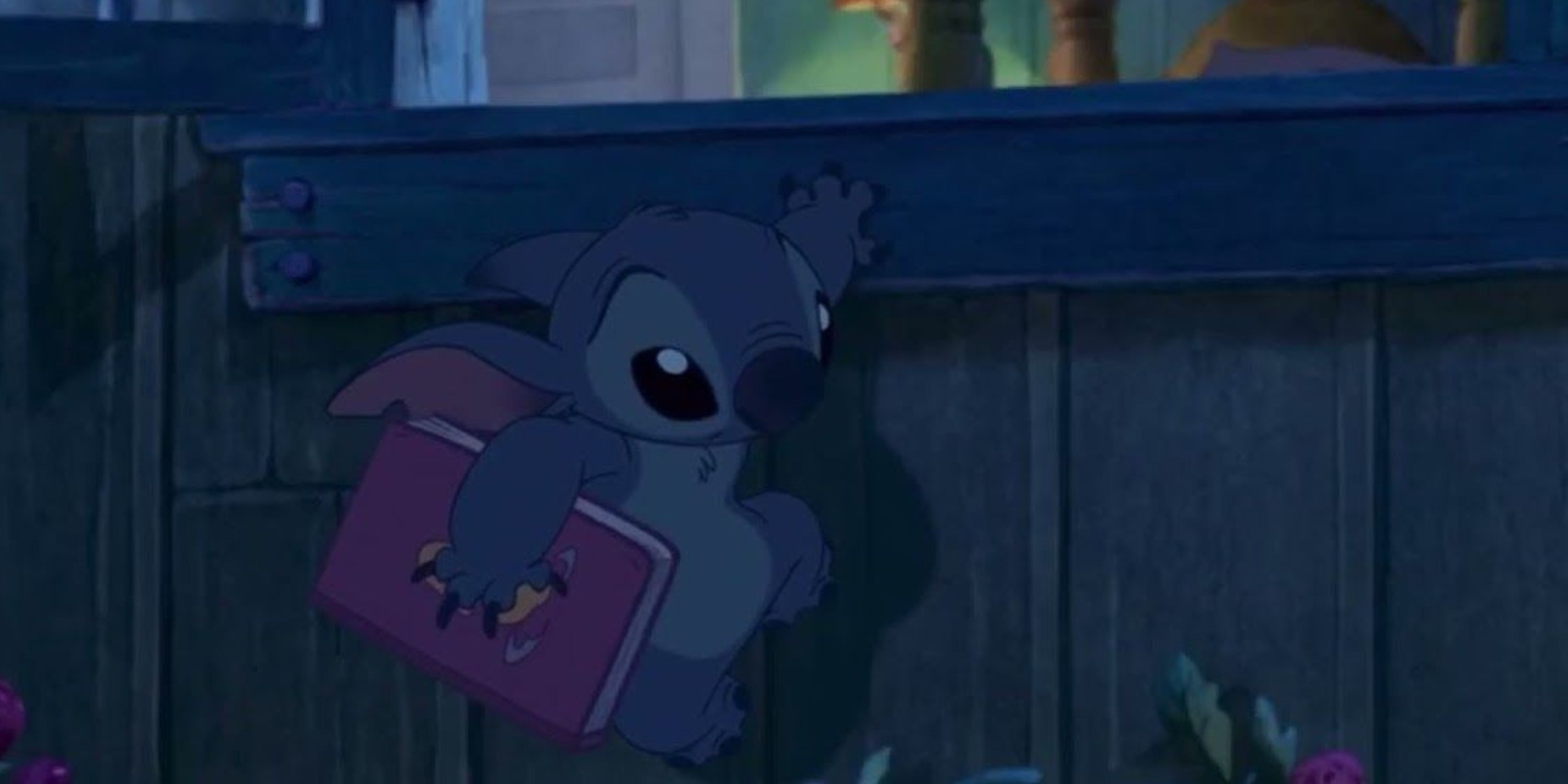 Stitch climbing out of the window in Lilo and Stitch (2002)