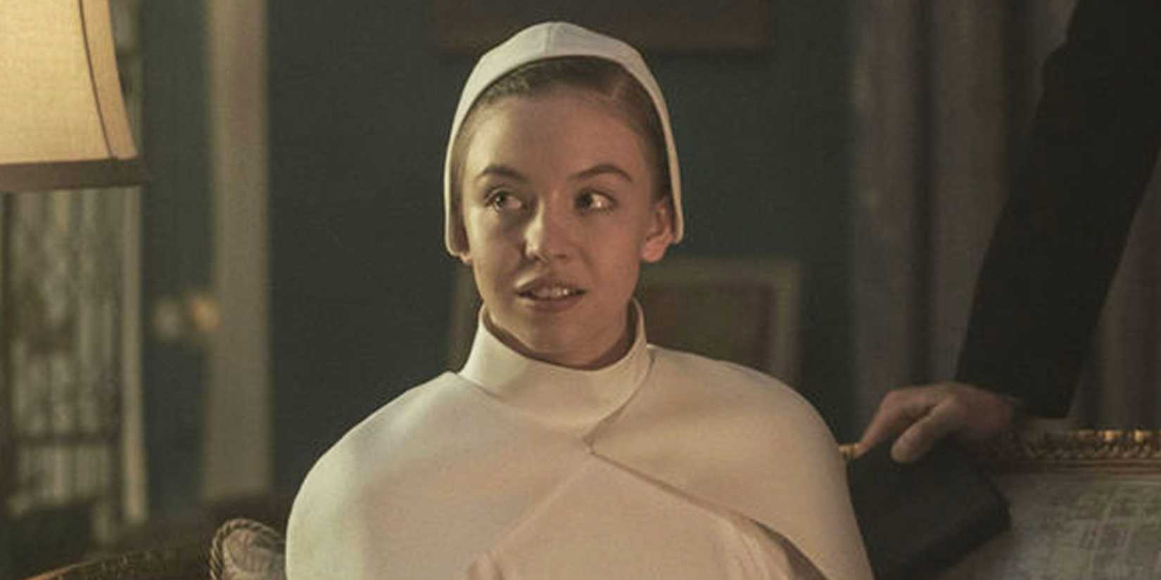 Sydney Sweeney as Eden in white in The Handmaid's Tale