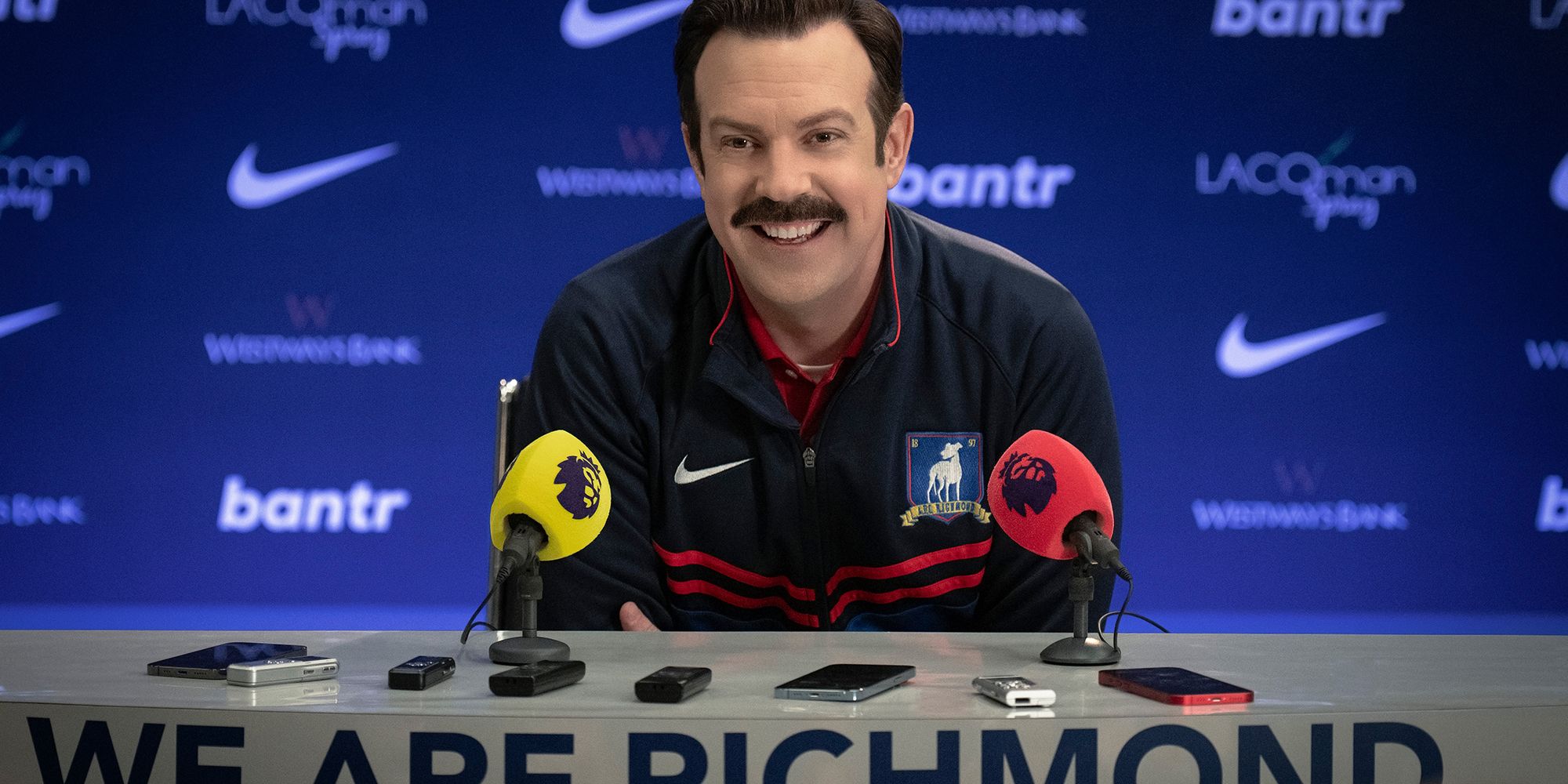 ted lasso at a press conference season 3