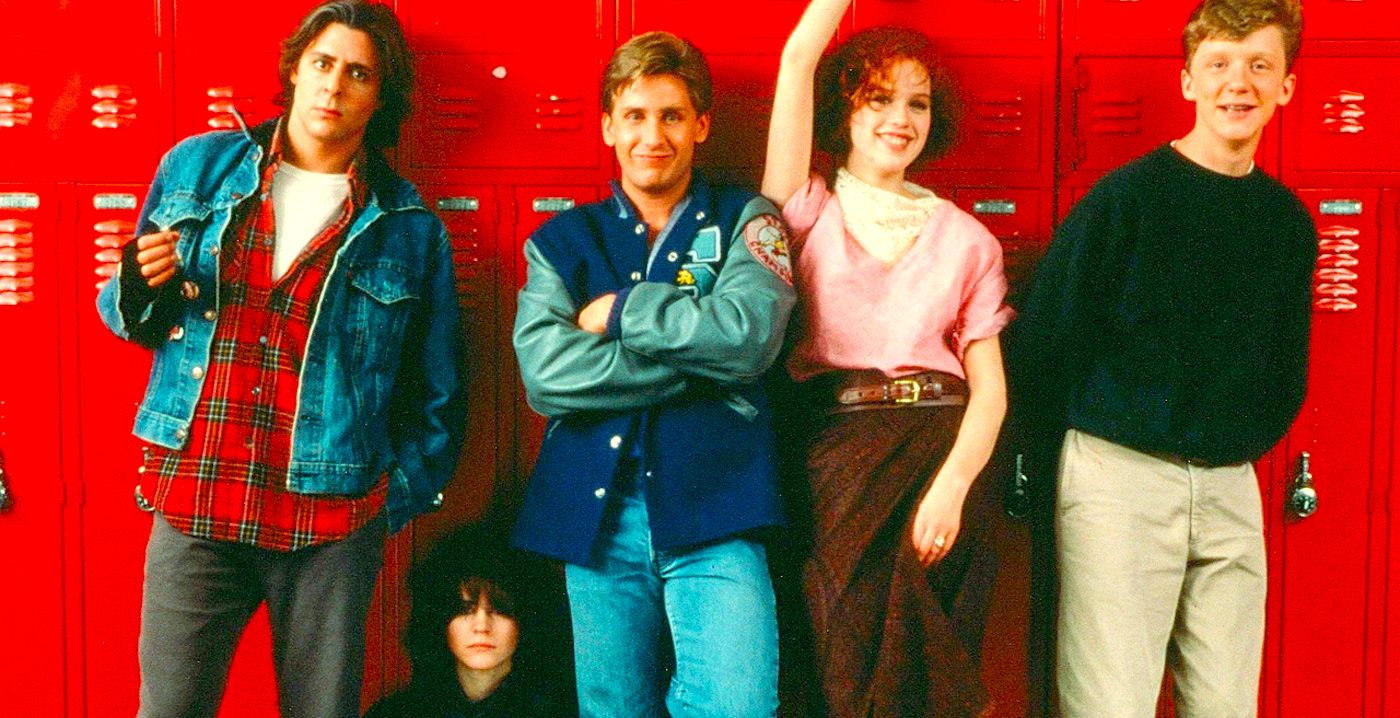The Breakfast Club cast in front of red lockers