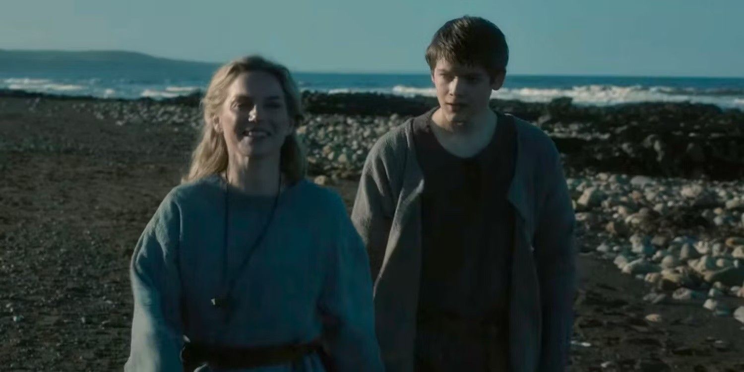 Hild walking next to Osbert in The Last Kingdom.