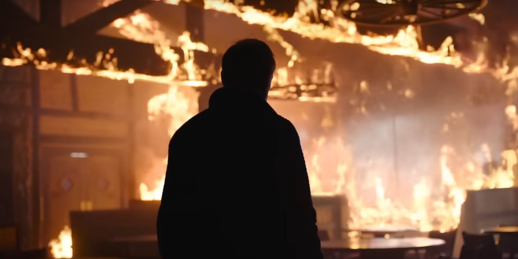 The Last of Us Season 1 Episode 8 David standing in front of  fire