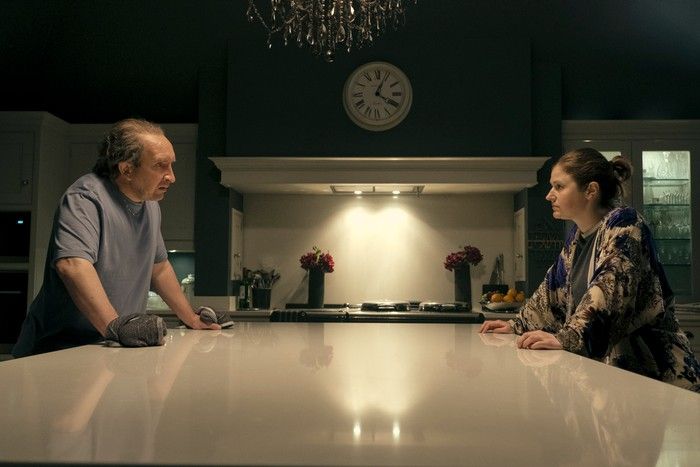 The Power&rsquo;s Roxy and Bernie Monke standing at opposite sides of a kitchen island.