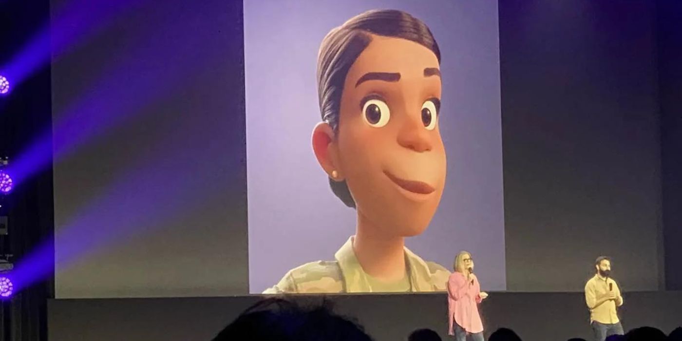 The producers of Elio at D23 with Olga in the background