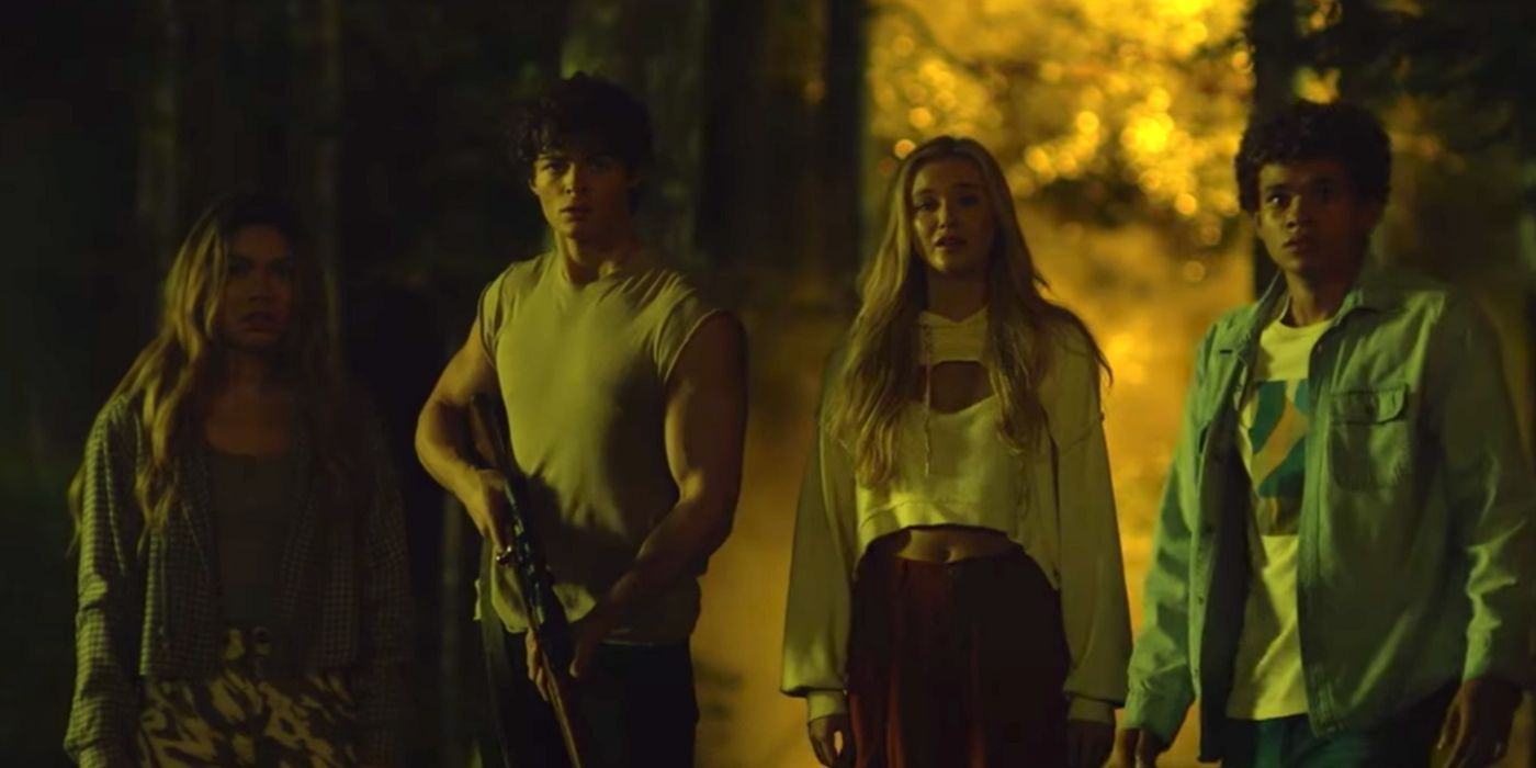 The teenagers standing together in a forest in Wolf Pack