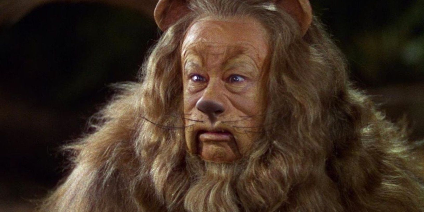 The Cowardly Lion (Bert Lahr) looking scared in The Wizard of Oz