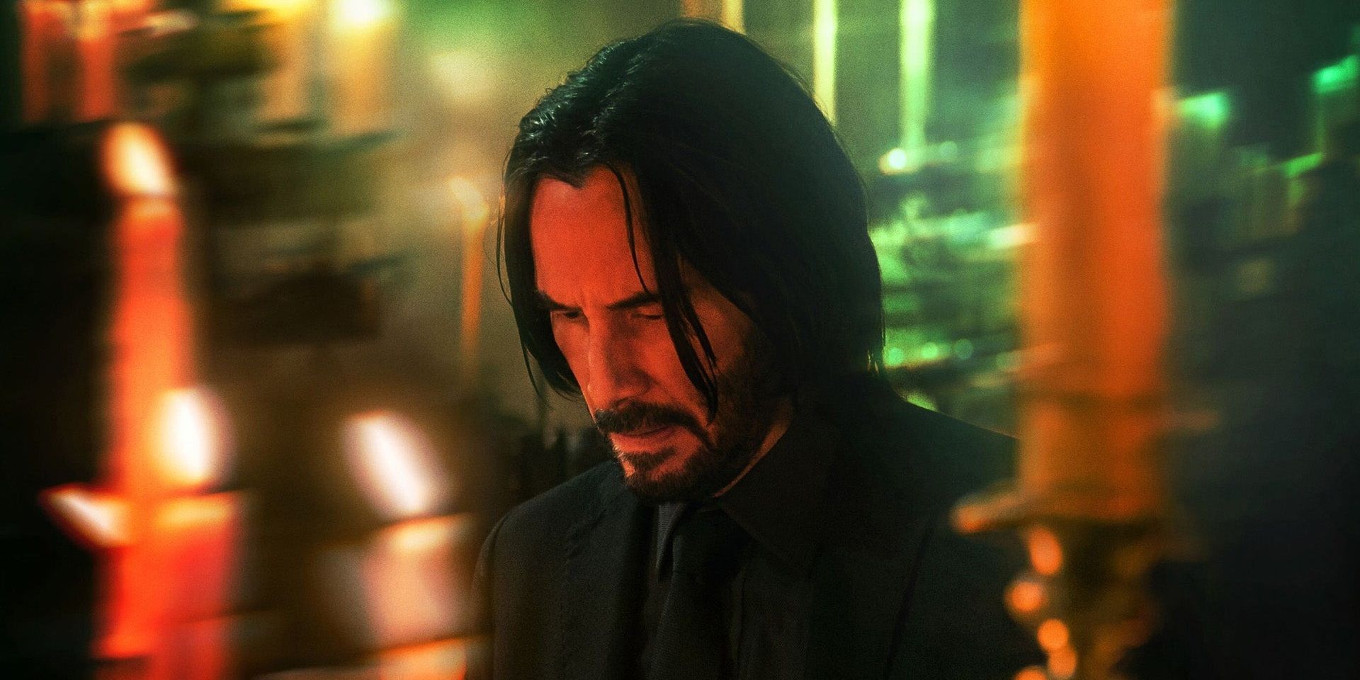 The first official image from John Wick Chapter 4 with Keanu Reeves looking down