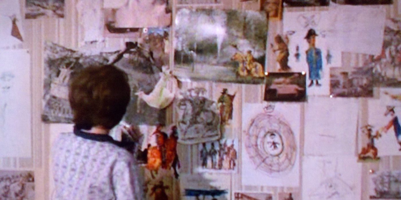 Kevin mira los dibujos en su pared de Time Bandits 