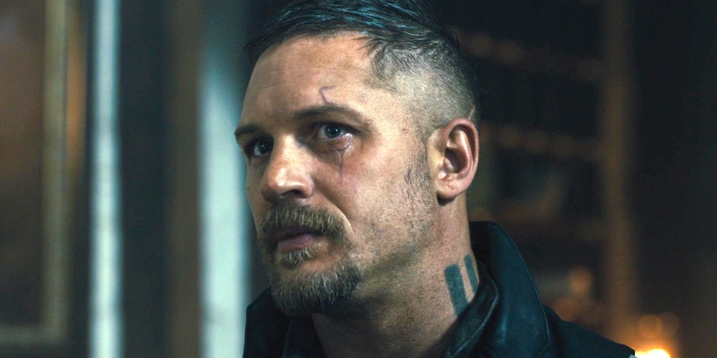 Tom Hardy in Taboo season 1 with facial scars and neck tattoos, looking crazily intense